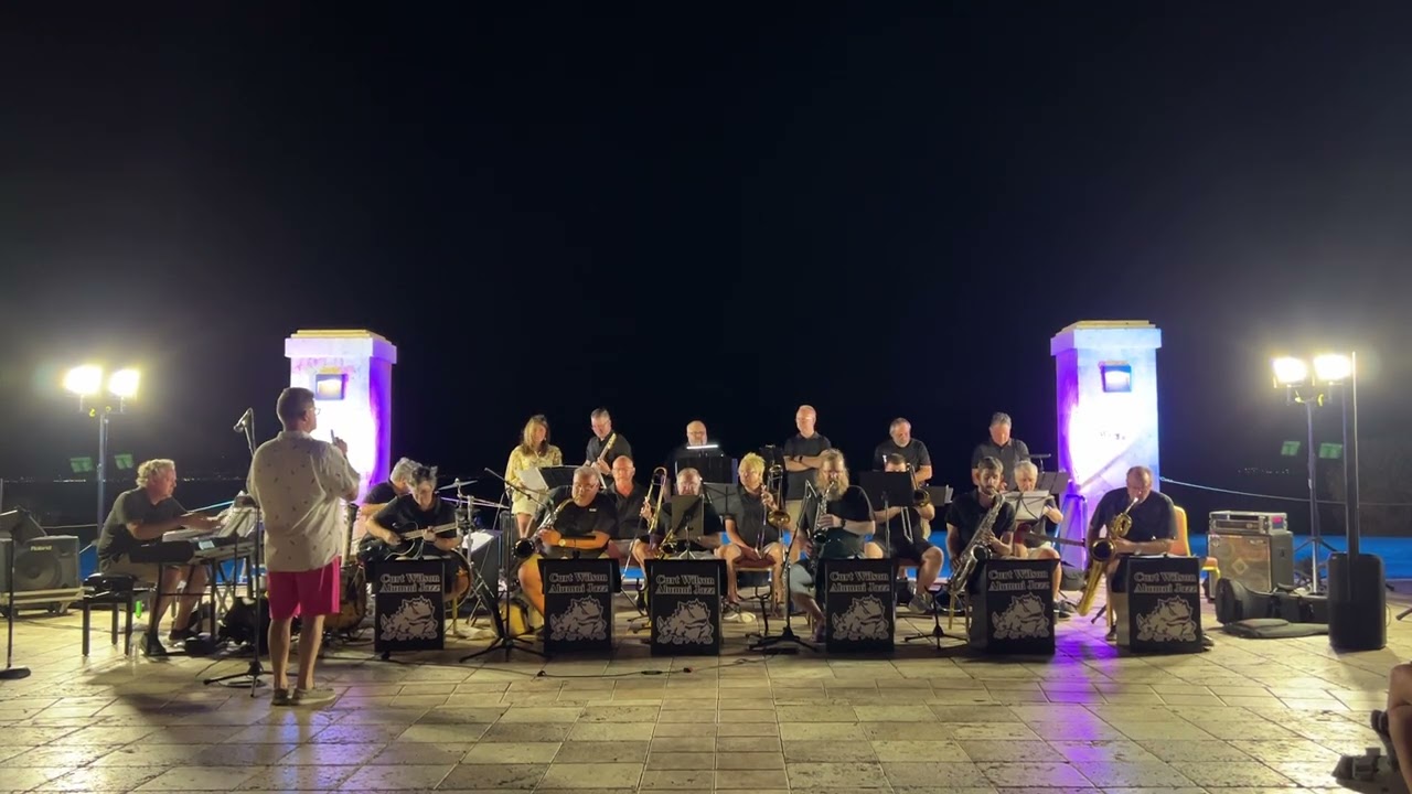 A Warm Breeze (composed and arranged by Sammy Nestico), performed by the Curt Wilson Alumni Big Band