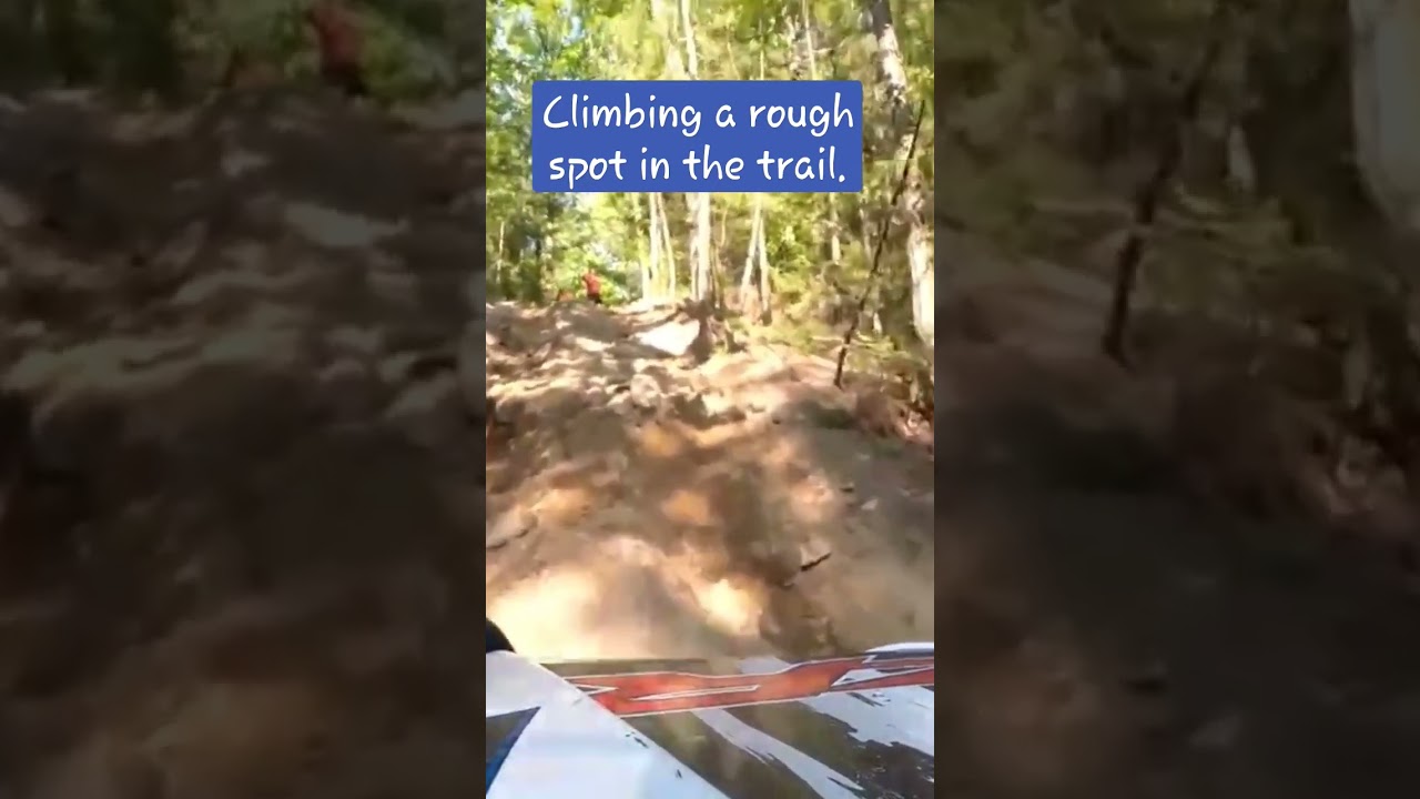 Climbing a rough spot in the trail! 2012 RZR 800 4