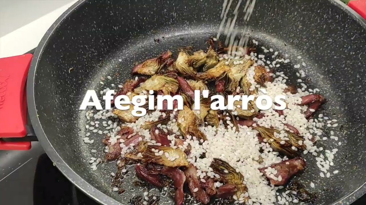 Daniñano arròs amb confit d'ànec i carxofes