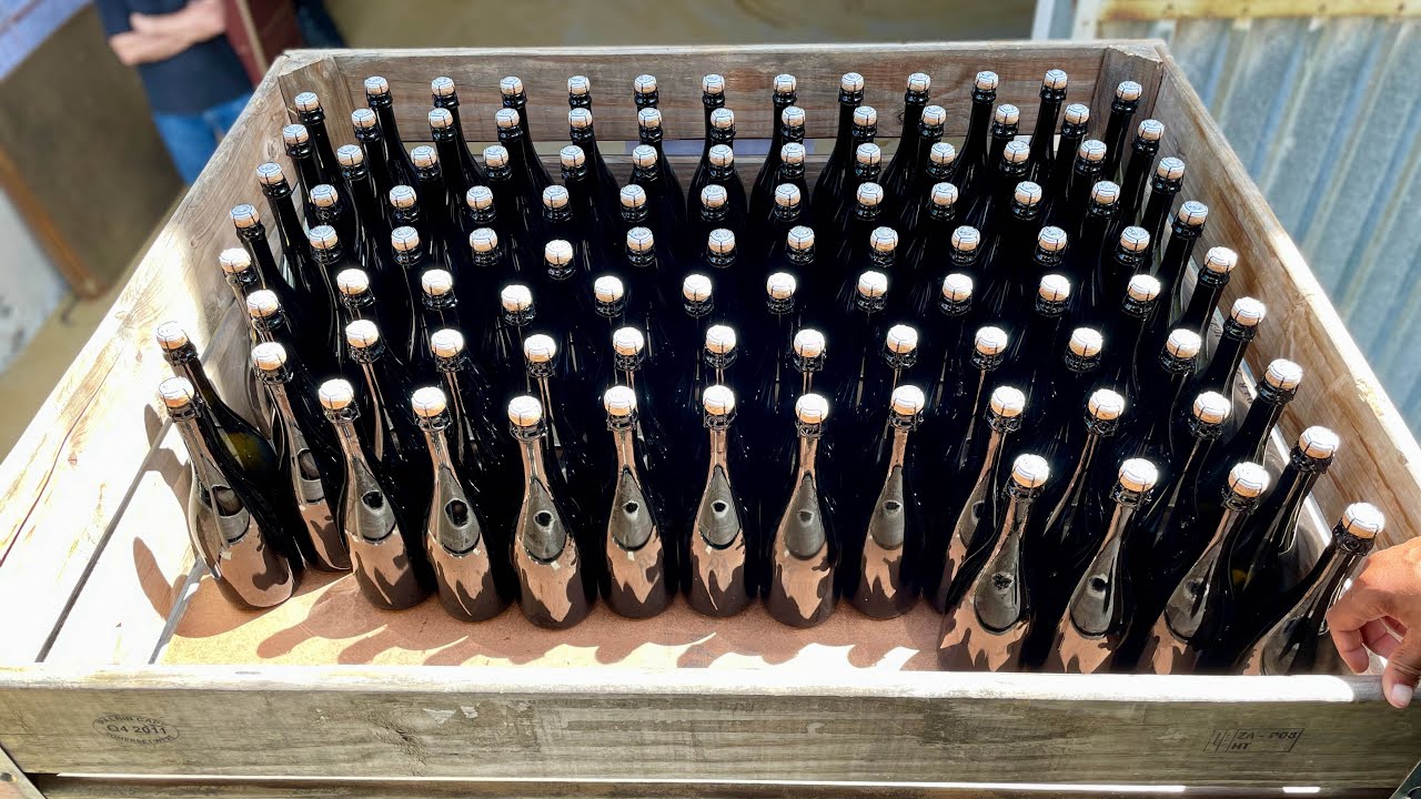 Disgorgement of Stellenbosch Hills Cap Classique in Medea Bottles