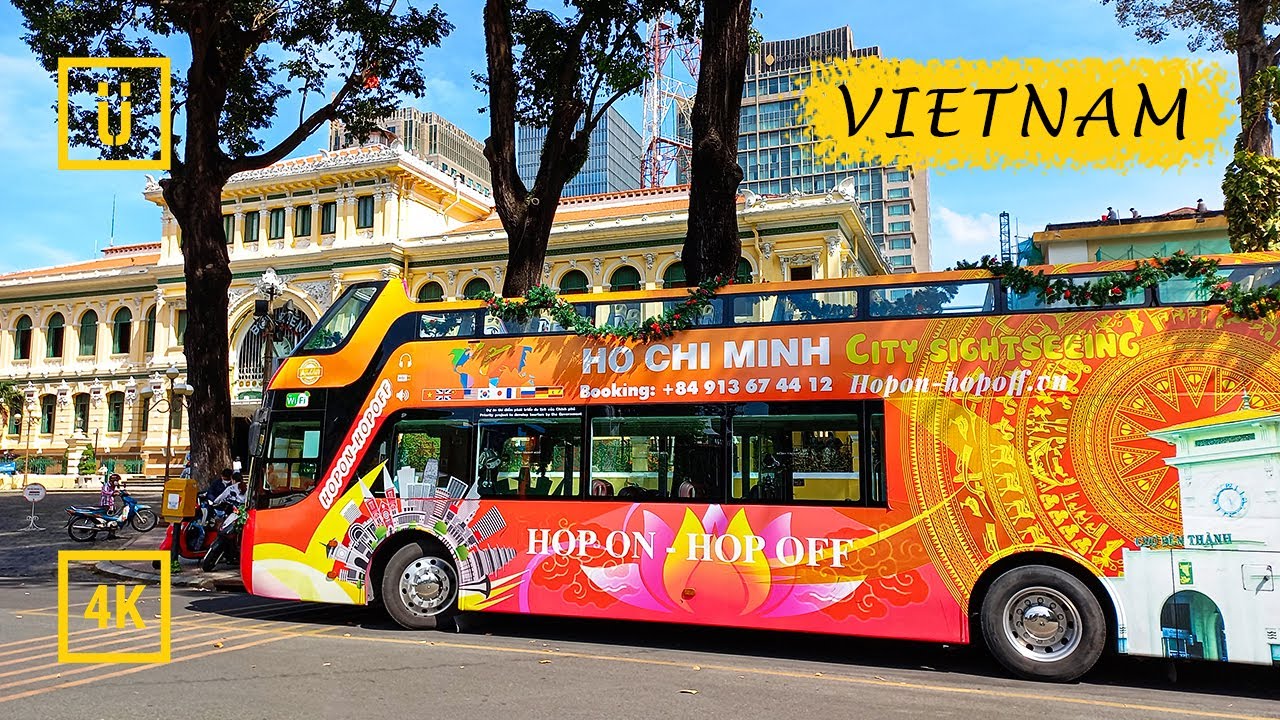 Exploring Ho Chi Minh City with a Hop on/Hop off bus tour. Binaural Audio. [4K bus ride]