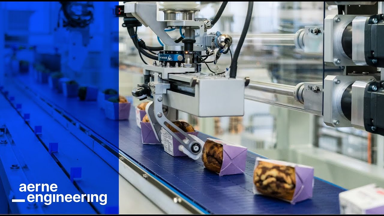 Bäckerei | Automatische Positionierungs- und Verpackungsanlage mit Roboter und Fördertechnik