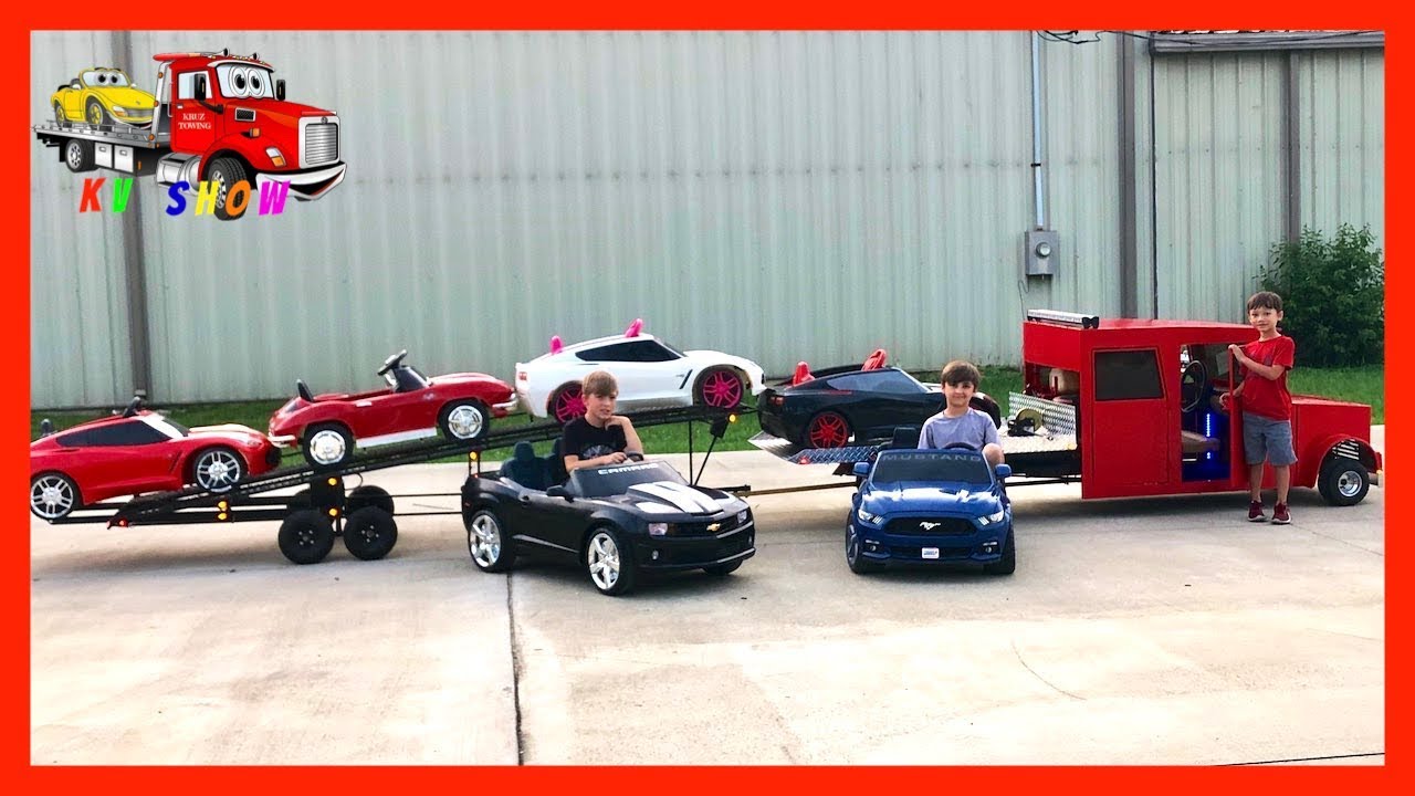 Kruz Loading and Hauling Powered Ride on Cars with His Cousins