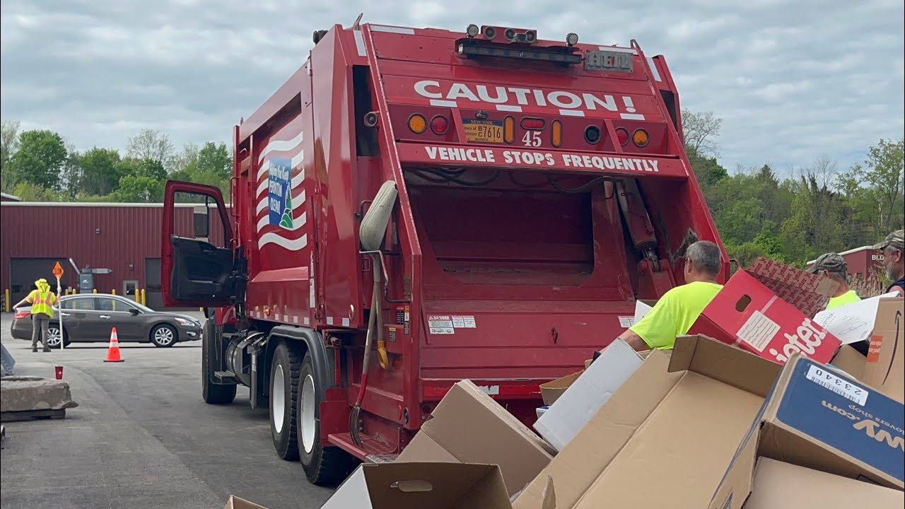 Town of Perinton International Heil Rear Loader Garbage Truck Packing A Mountain Of Bulky Cardboard