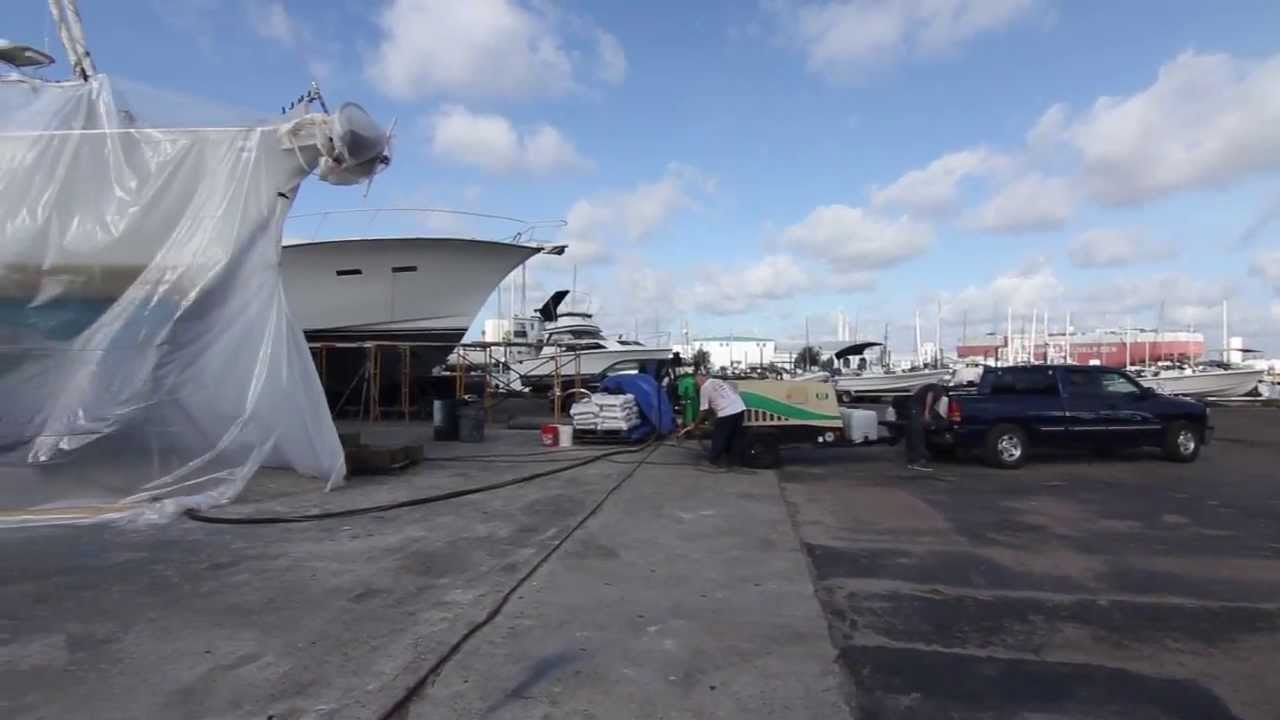Dustless Blasting a 61 Foot Steel Boat