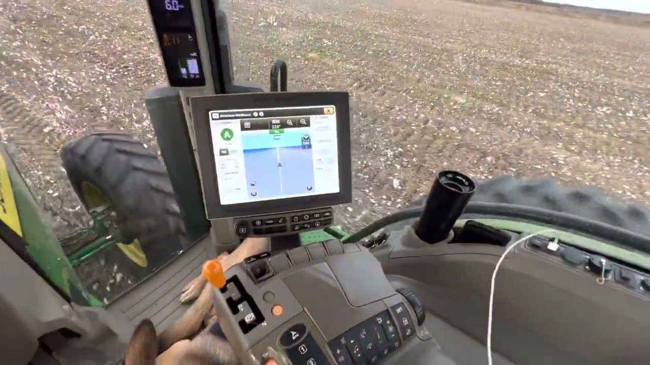 Pulling cotton stalks John Deere 8r Amadas stalk puller with Max the German Shepherd