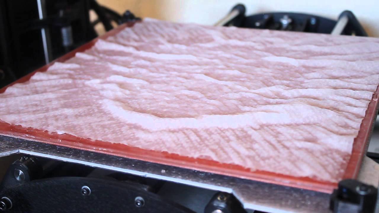 Removing ABS slurry from print bed.