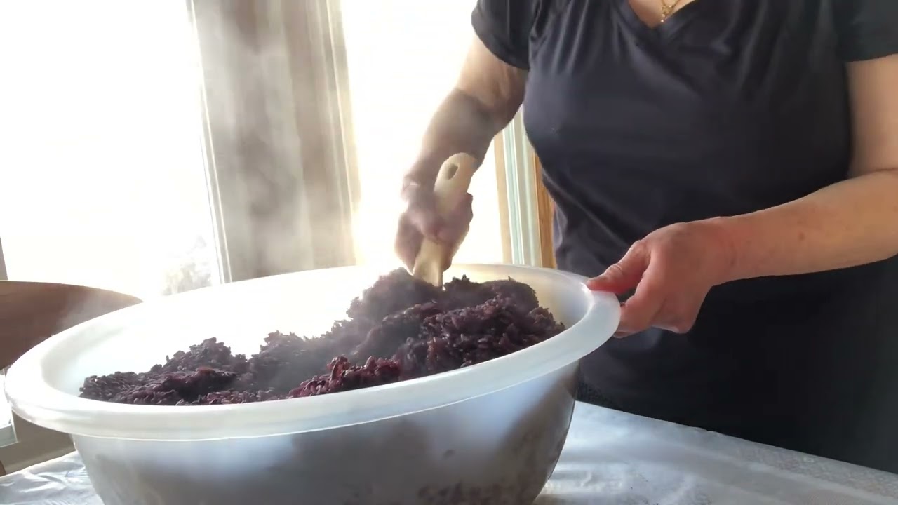 Mom’s cooking make purple sticky rice  eating and for protection noj mov nrhaav tiv thaiv yug