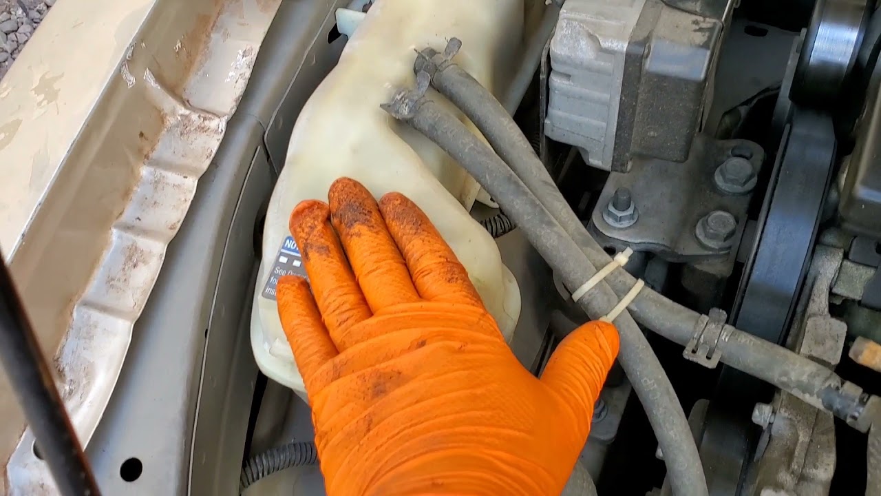 Pontiac grand AM 2005 3.4 como cambiar el termostato