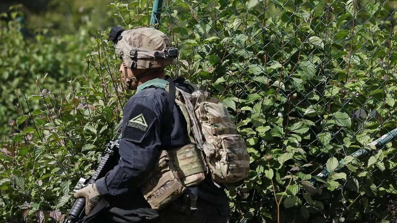 U.S. Soldiers take on the role of the enemy as Opposing Forces (OPFOR)