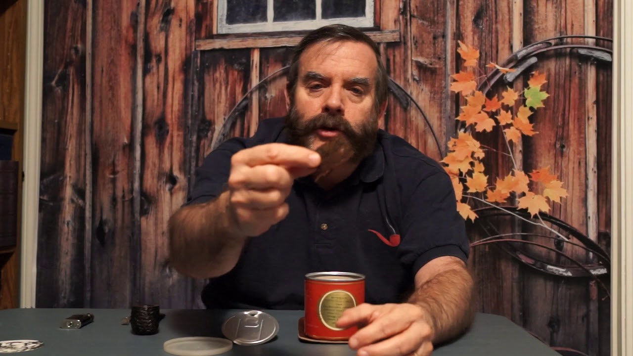 The Opening of a 20 year old tin of Tobacco