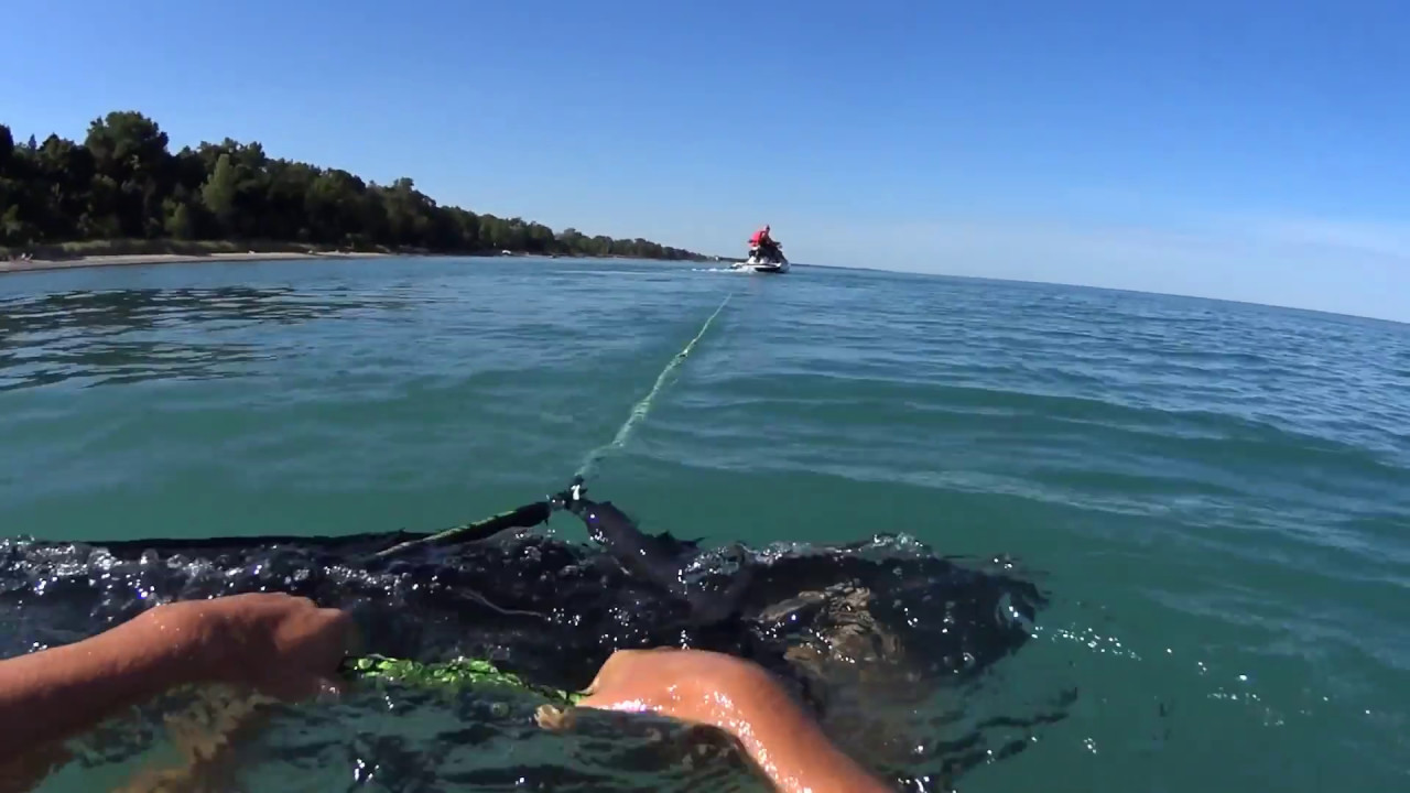 Wakeskate behind Sea Doo wake 155