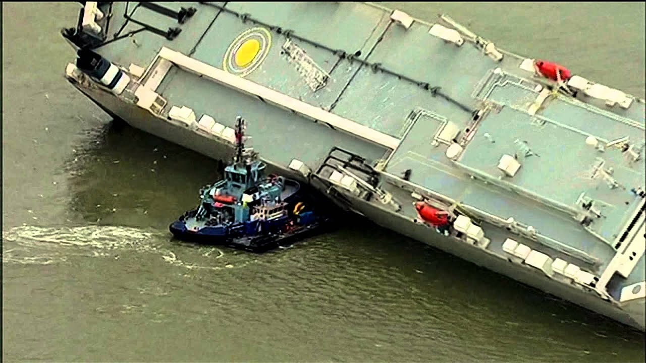 Stunning Image of Cargo Ship Carrying Luxury Cars Grounded