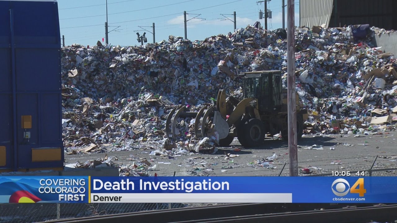 Body Tumbles Out Of Trash Truck
