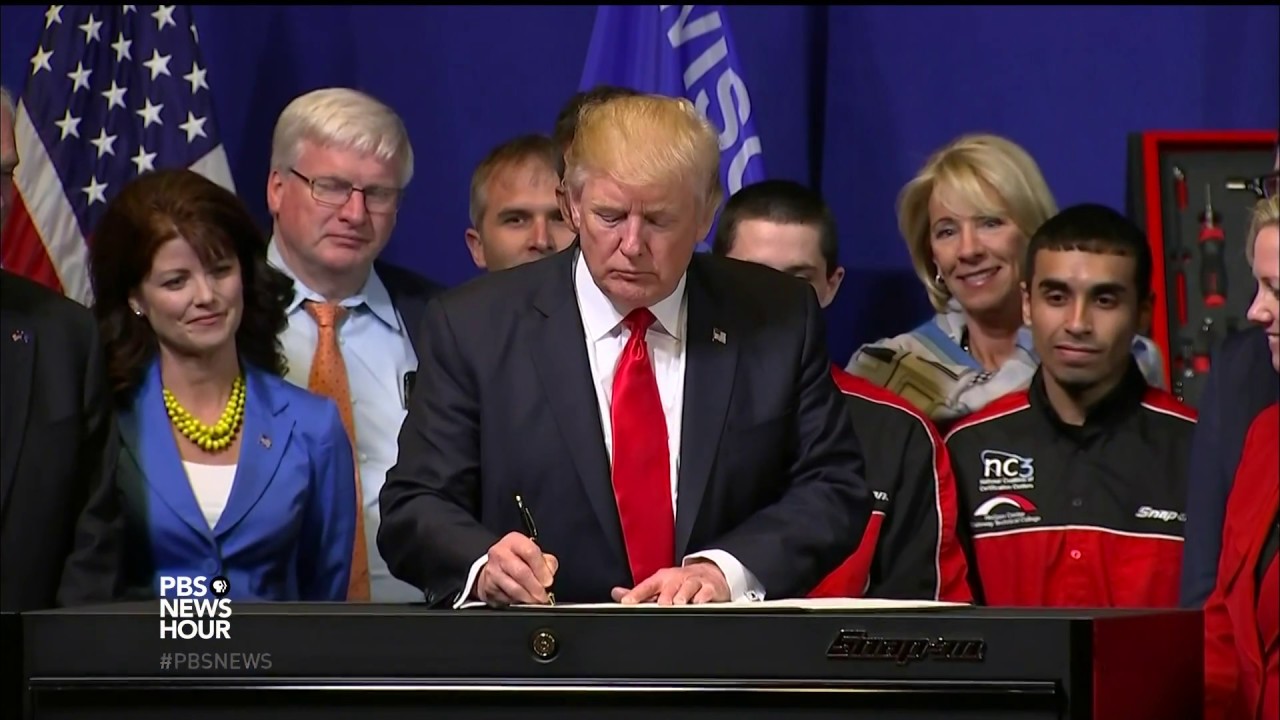 How could the H-1B visa program for foreign workers be improved?