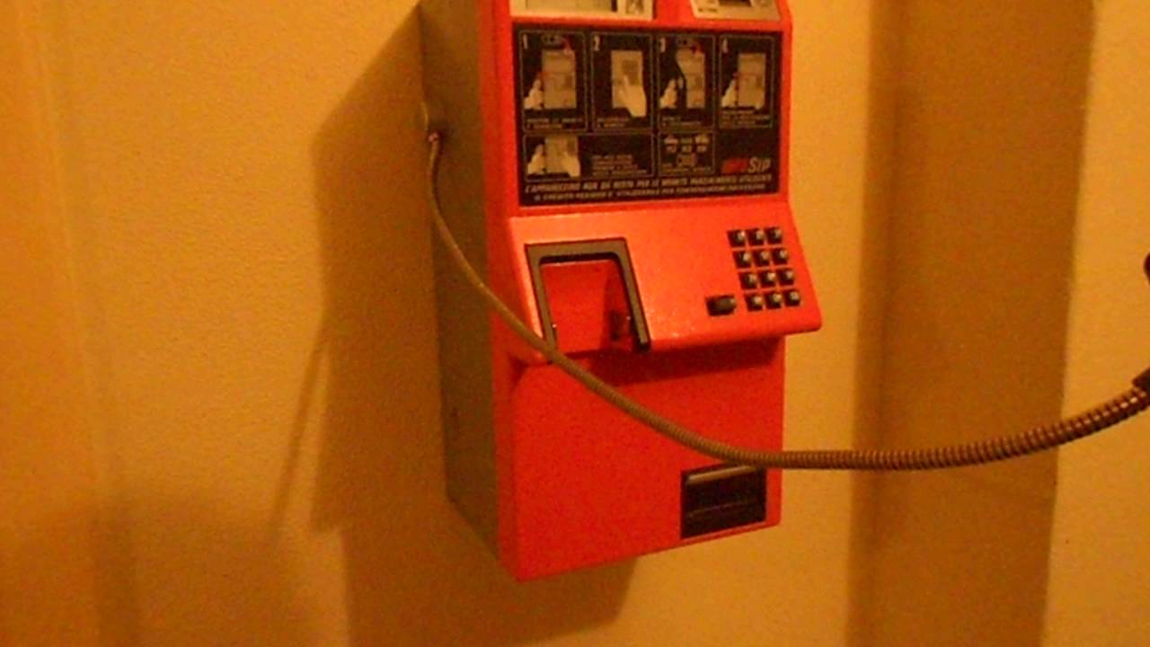 Telefono pubblico rotor, funzionante con gettoni e monete da 100 200 e 500 Lire,
