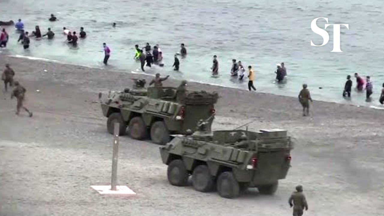 Thousands of migrants reach Spain from Morocco