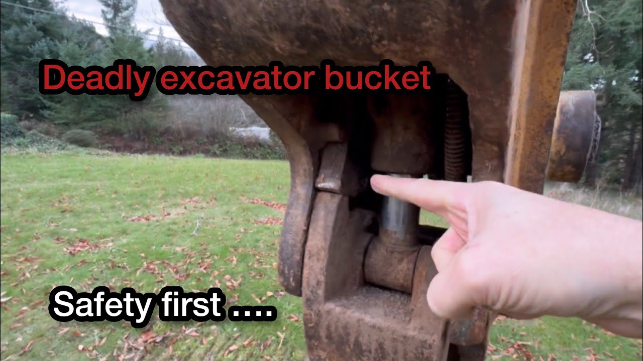 Excavator bucket, falling off to kill…