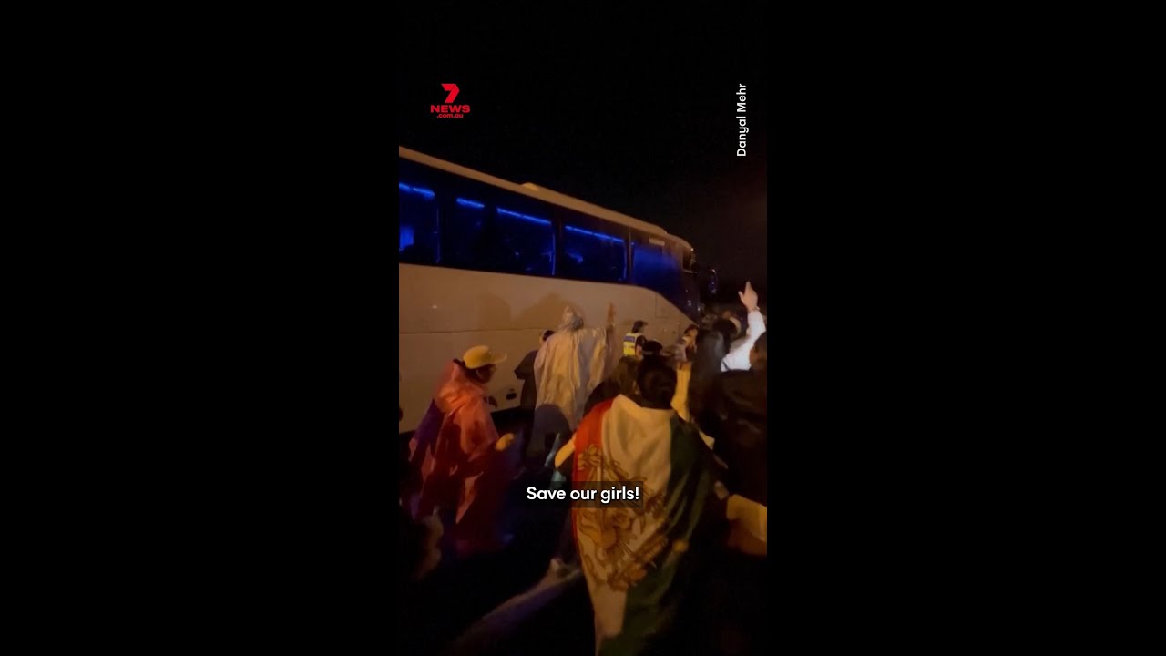 Protesters block bus as Iran players face up to &lsquo;grave&rsquo; fears