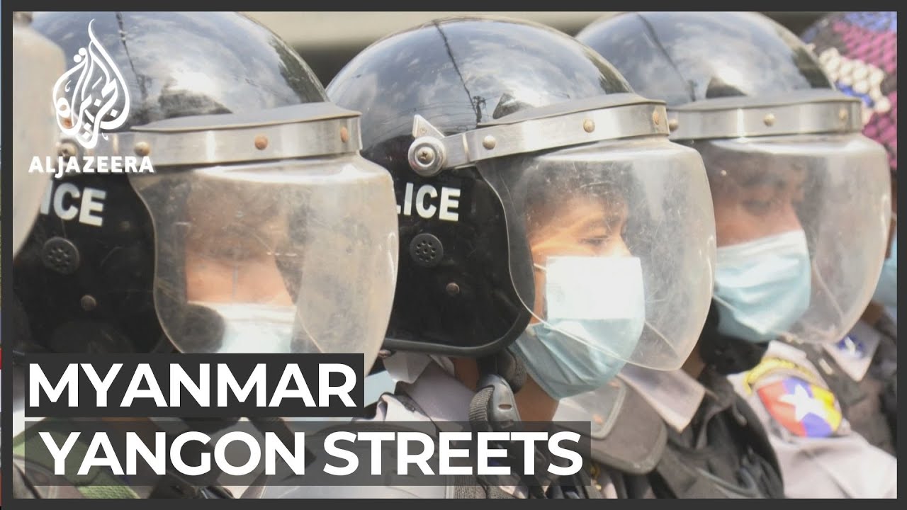 Thousands of Myanmar protesters in standoff with police in Yangon