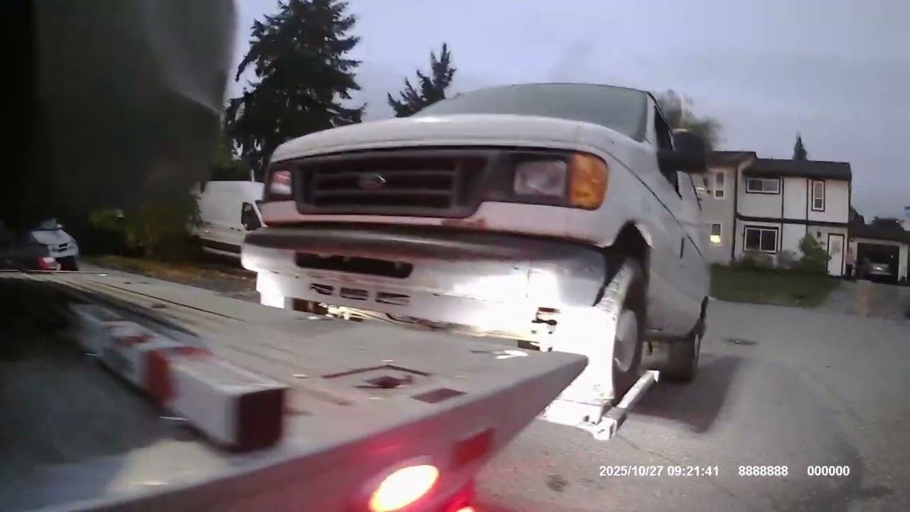 Loading E-250 heavy Van on wheel lift@phoenix Roadside Services 