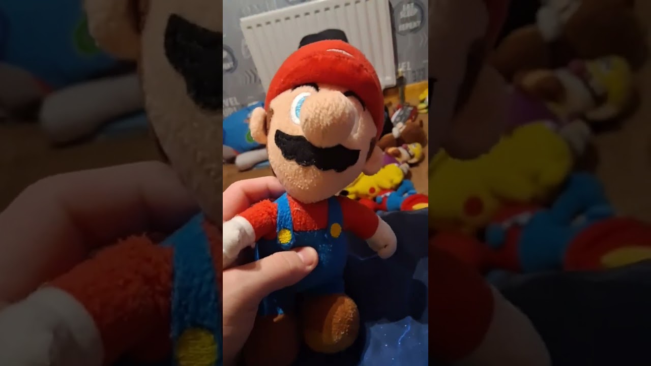 Super mario plush   luigi gets hit by newscaster cat marios car 