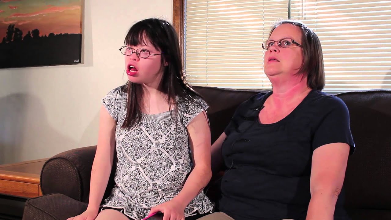 Teenage girl with Down Syndrome sings to Jesus