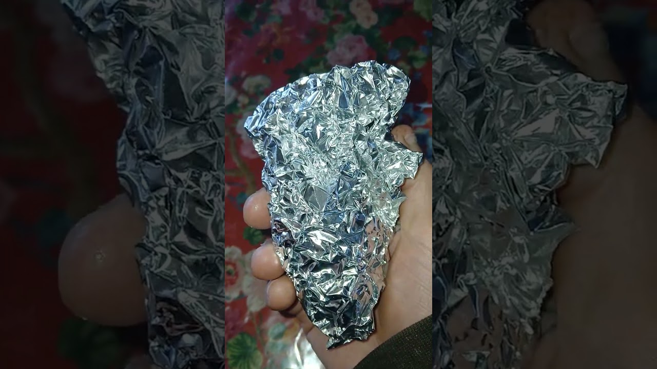 Aluminum.  Using aluminum for scrubbing pots.