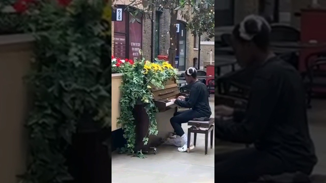 Girl plays Nocturne in C Sharp Minor in Liverpool Street 