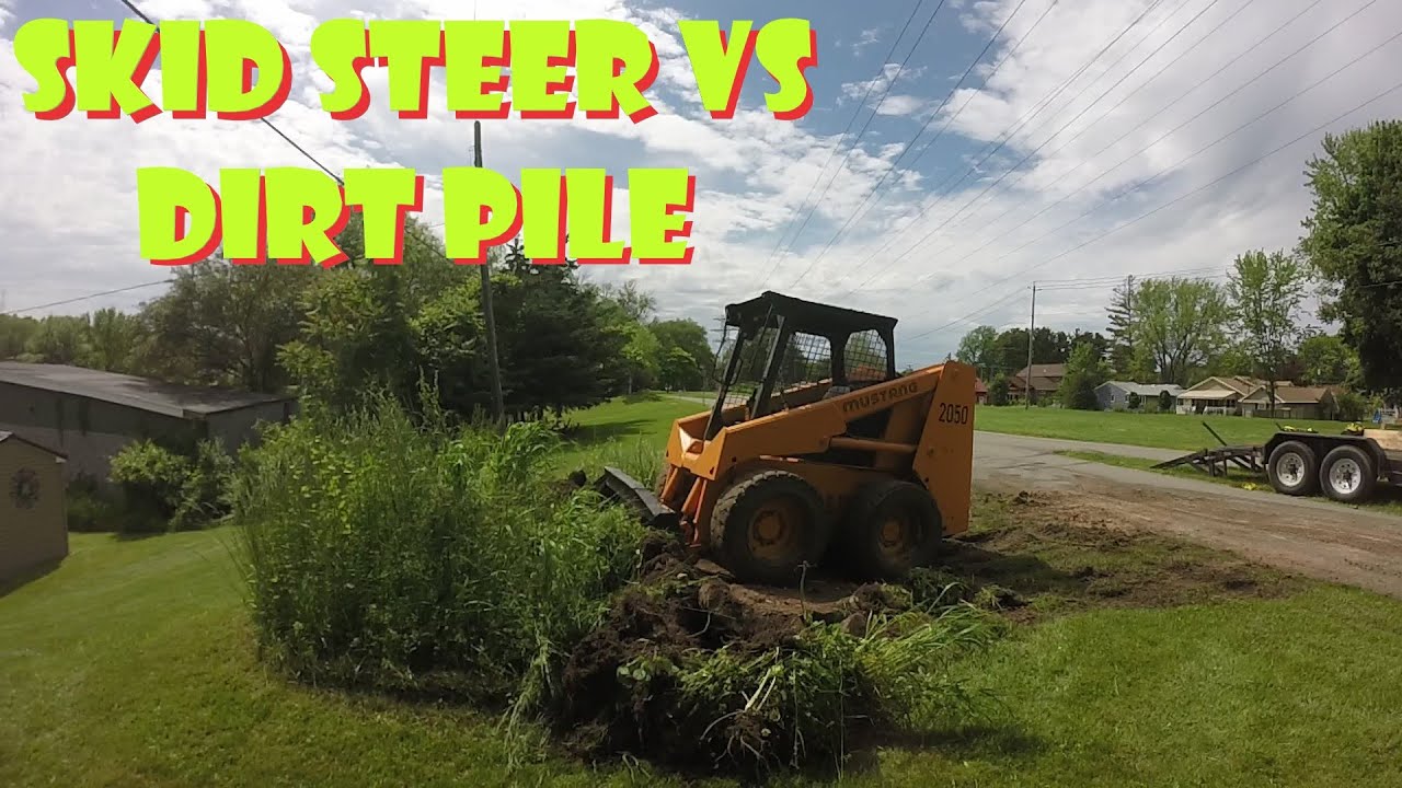 Removing an Ugly Mound of Dirt with Mustang 2050 Skid Steer & Ford Dump Truck