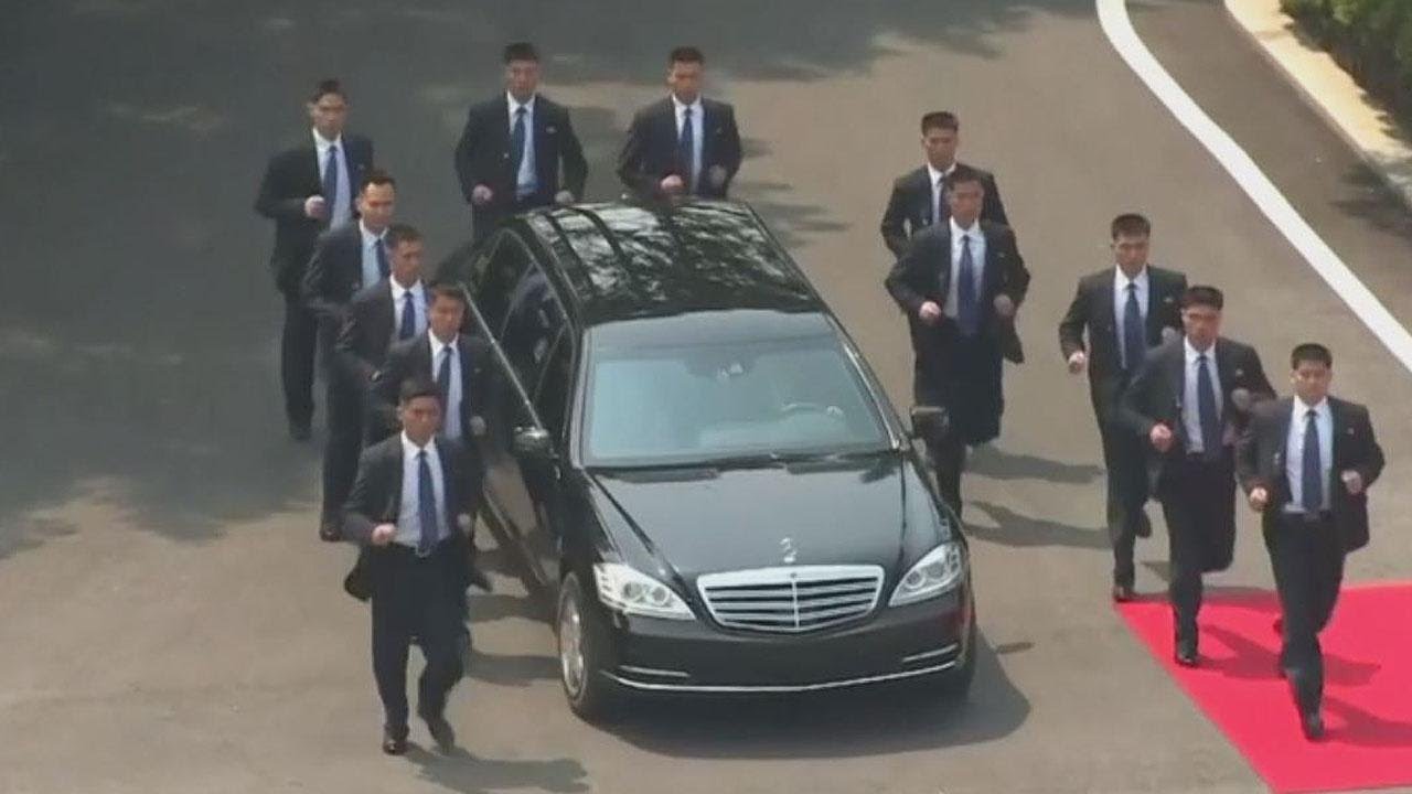 Kim Jong Un’s Elite North Korean Bodyguard Squad Turns Heads at Summit