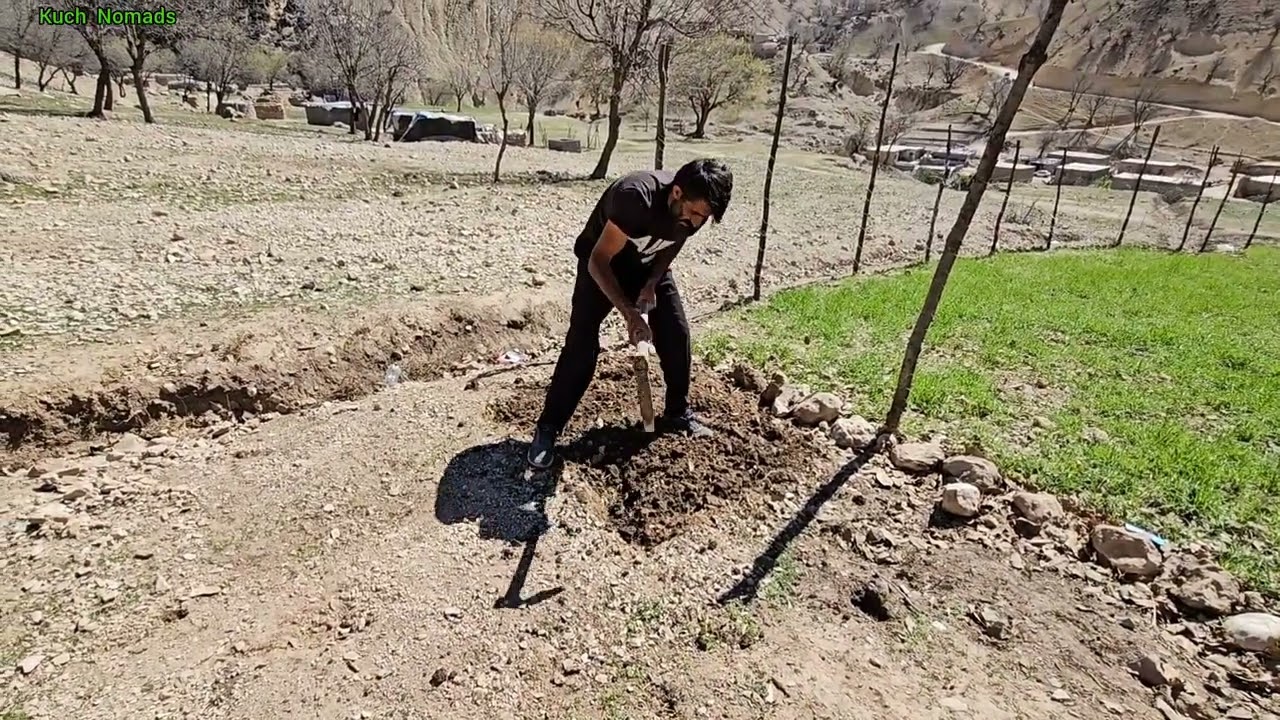 The tribal man's effort in the mountains preparing the land for planting vegetables