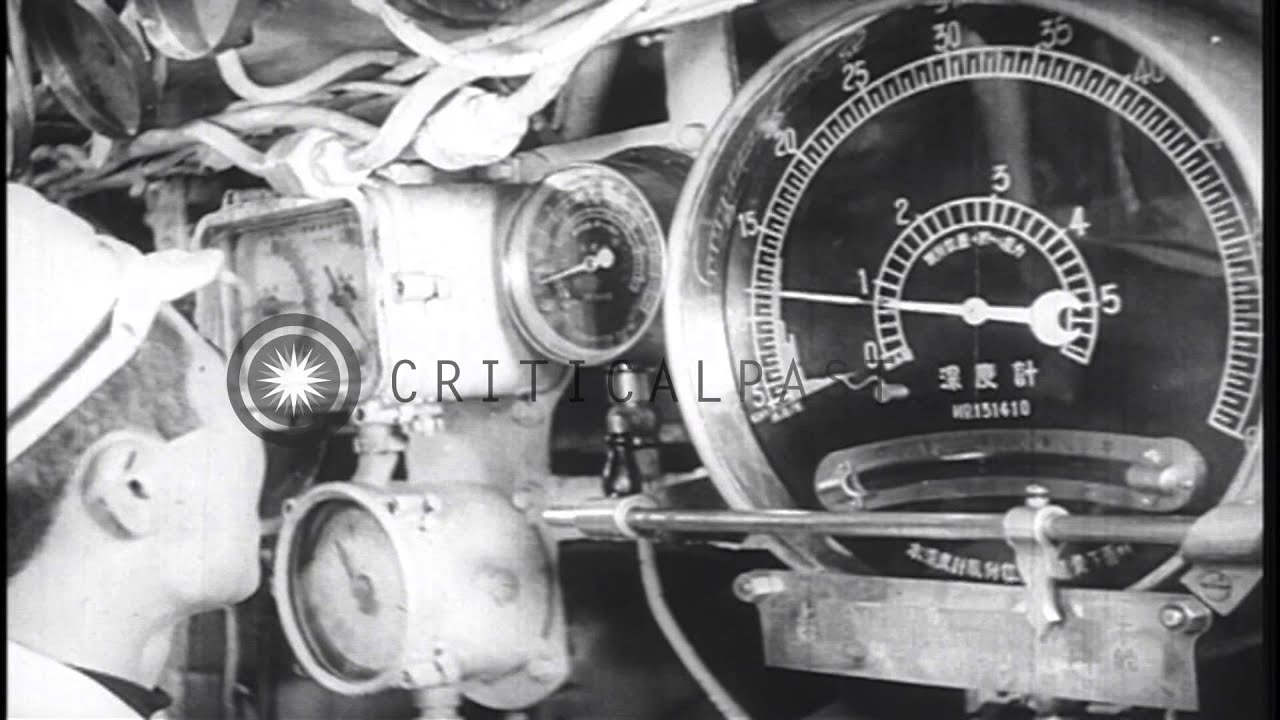 A Japanese submarine torpedoes a cruiser underway in the Pacific Ocean during Wor...HD Stock Footage