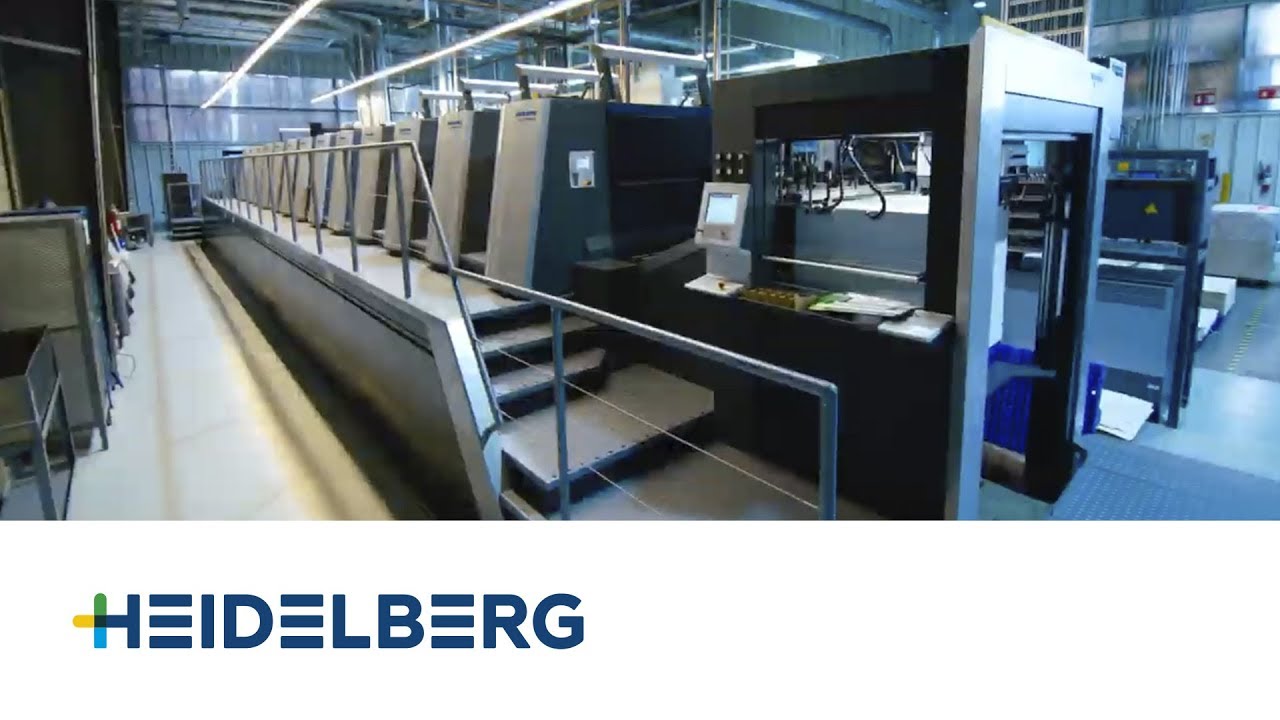 Unboxing a Speedmaster XL 106 packaging press with LED UV technology and first print.