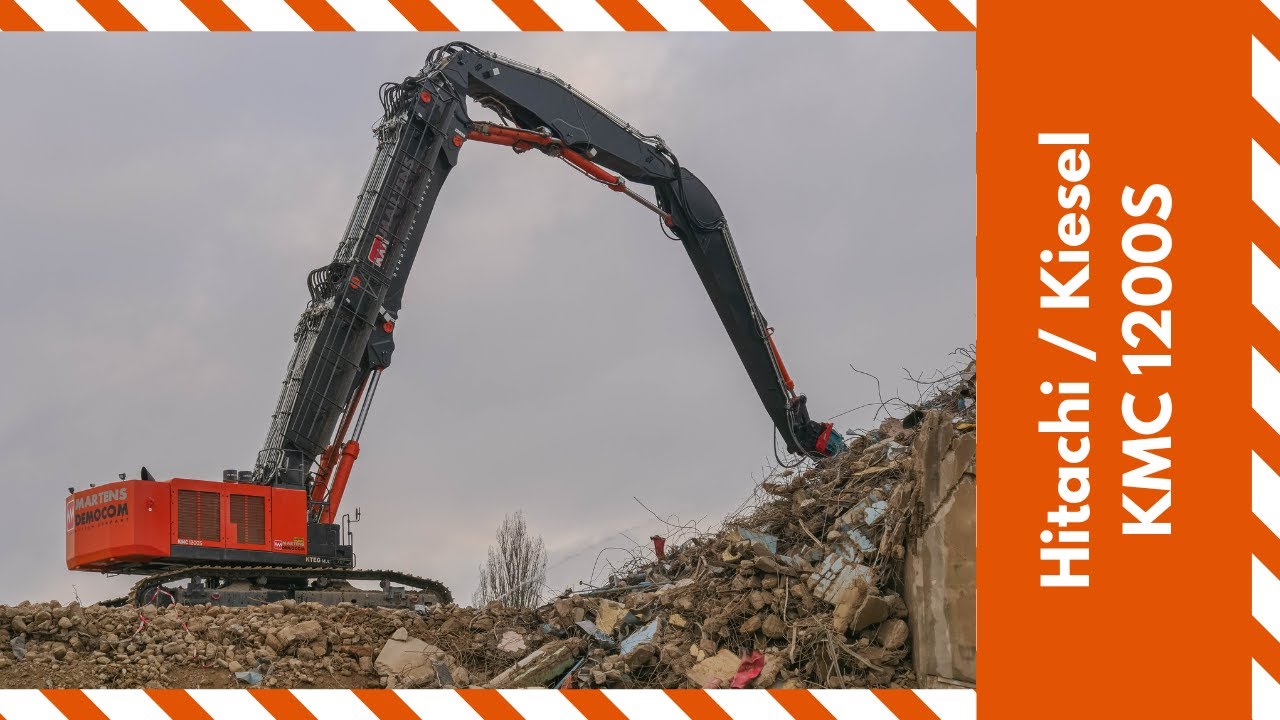 Spectacular, huge Kiesel / Hitachi KMC 1200S with a triple boom demolishing concrete silos