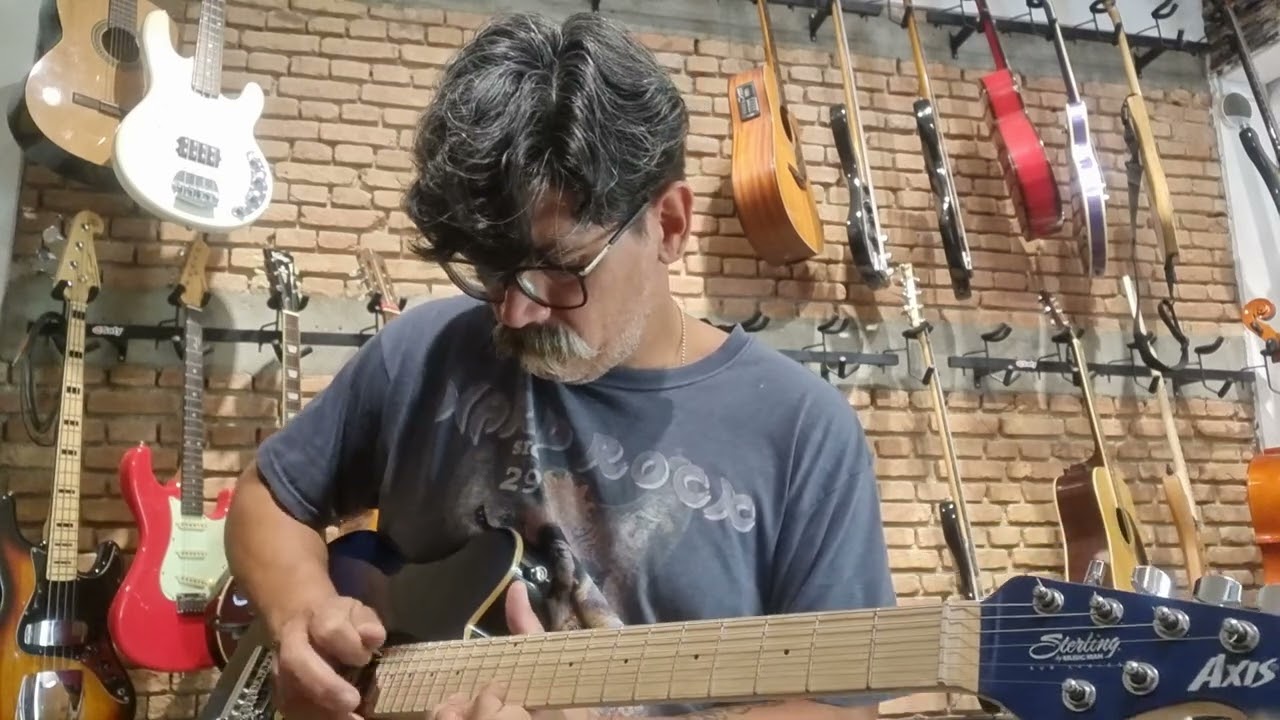 Guitarra Sterling Sub Series Axis Translucid Blue Epis&oacute;dio 3 de 4