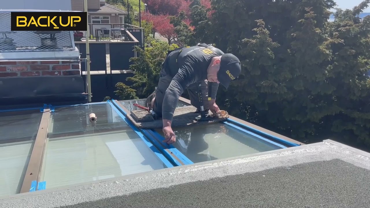 Sunroom Repair - Caulking Overhead Glass