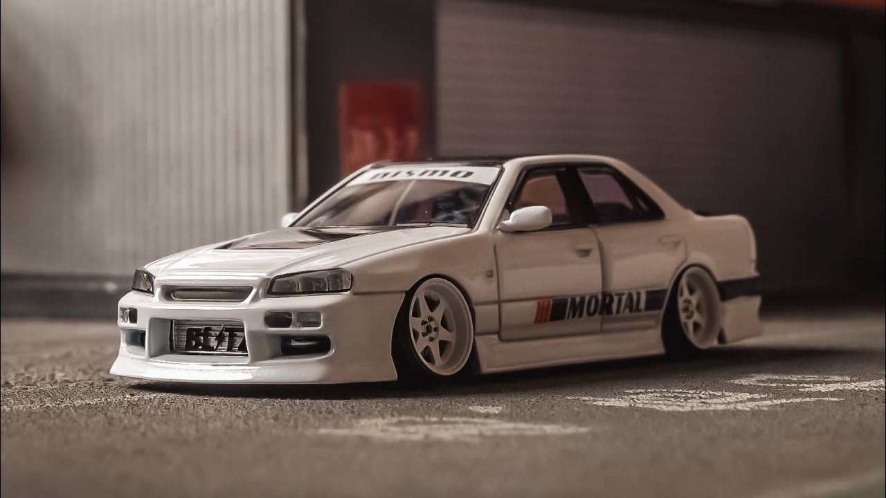 MORTAL 1/64 NISSAN URAS ER34 SKYLINE 25GT-T PEARL WHITE/ BLACK
