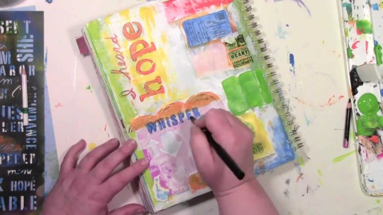 Using word stencils in a colorful art journal