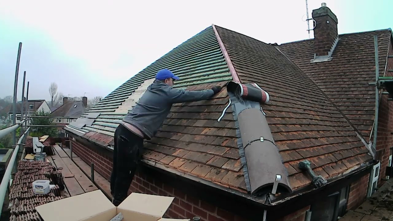tiling the roof of the double storey extension