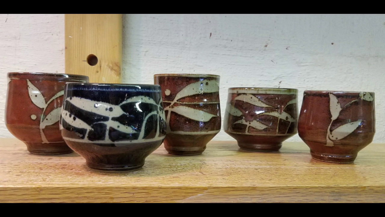 How I apply wax resist decoration to pots.