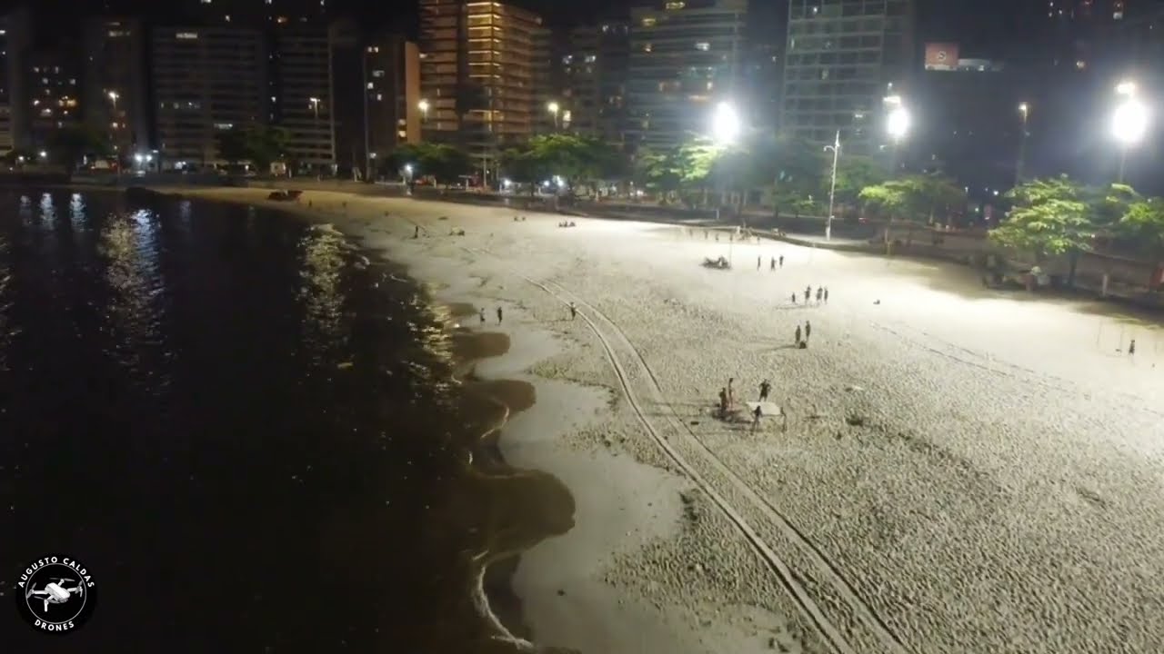 Voo noturno na praia de Icaraí