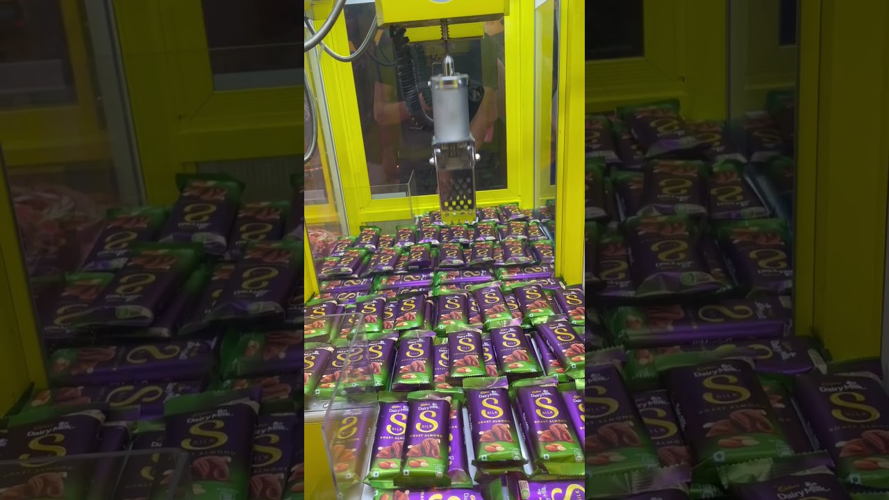 Great chocolate win 🍫 #arcade #timezone #arcadegames #clawmachine #gamezone #jackpot #gaming