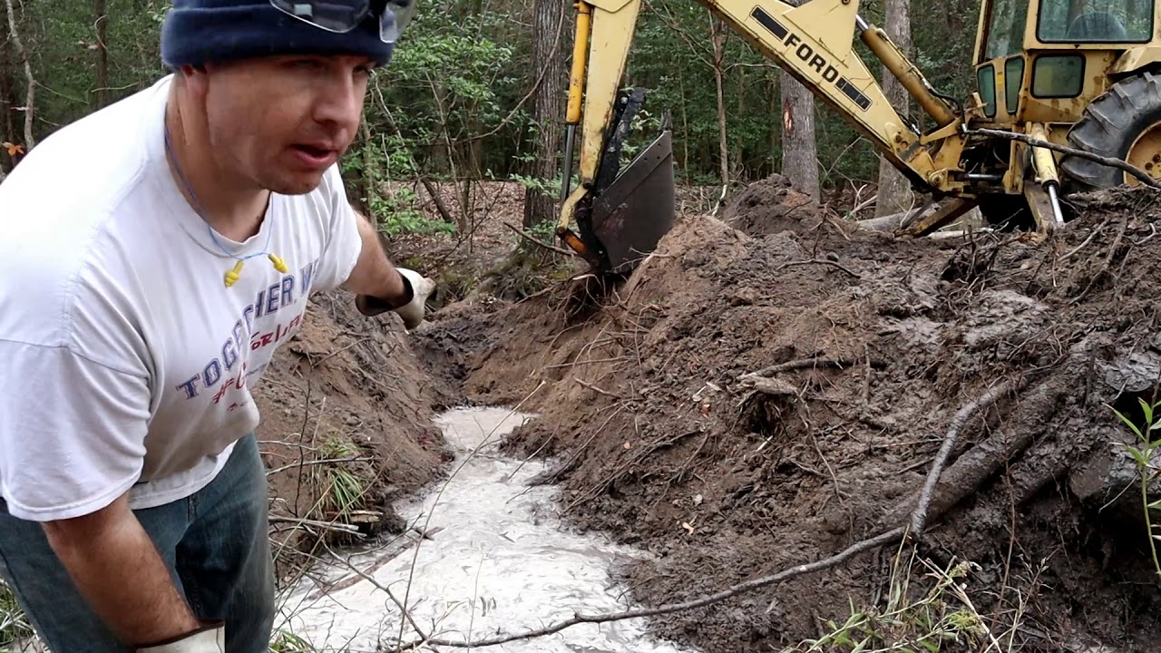 How To Re Route A Creek Stream With A Backhoe! MAN TIME!