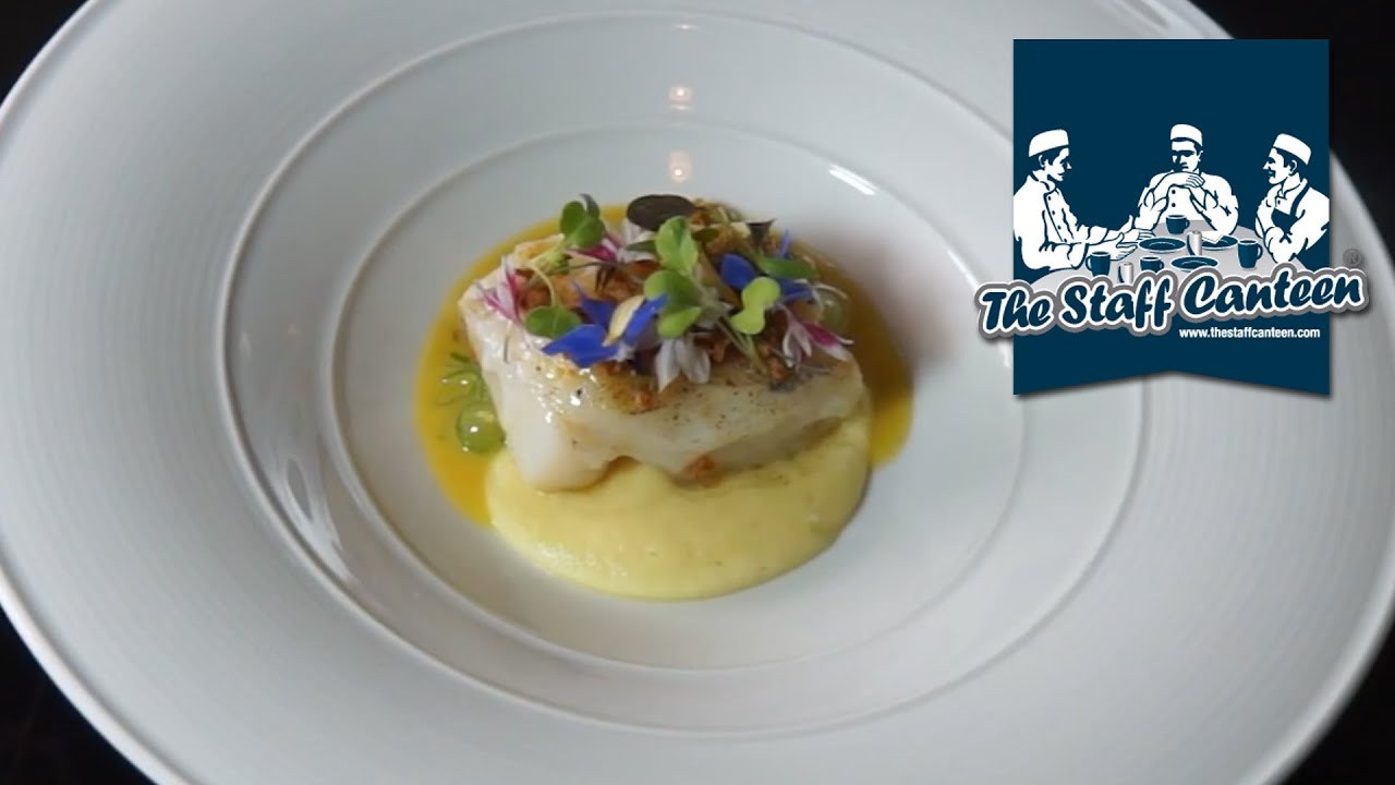 Michelin starred Chef Simon Hulstone prepares Cod with parsnip purée and cucumber