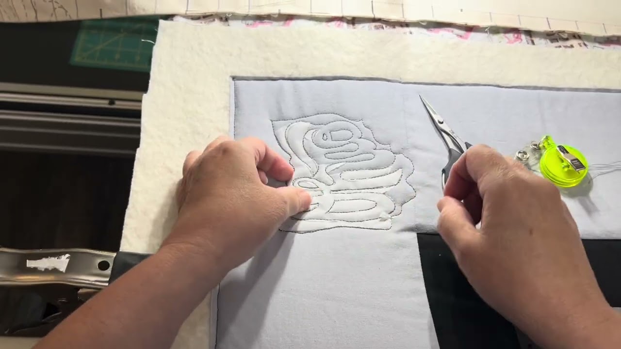 Custom quilting an alma mater quilt