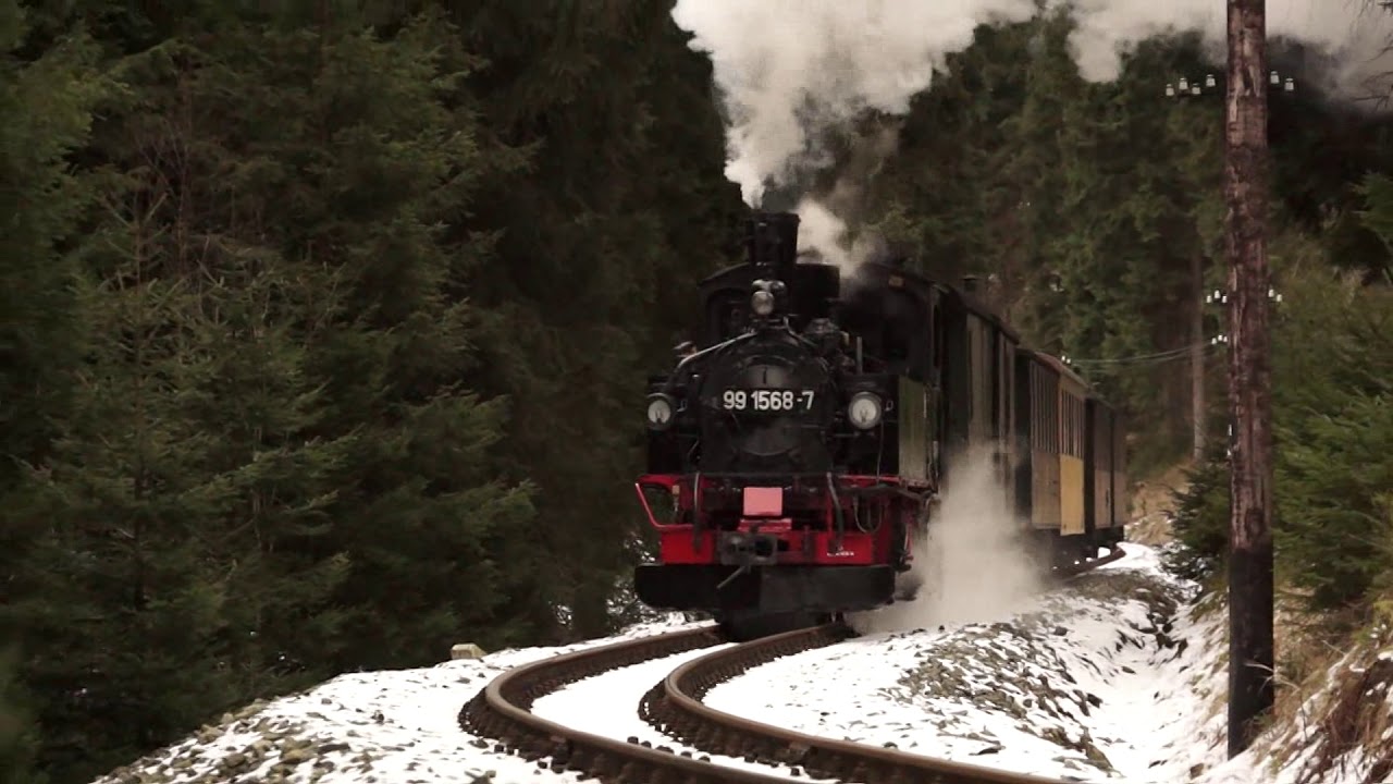Train with loco 99 1568 going through an s-bend