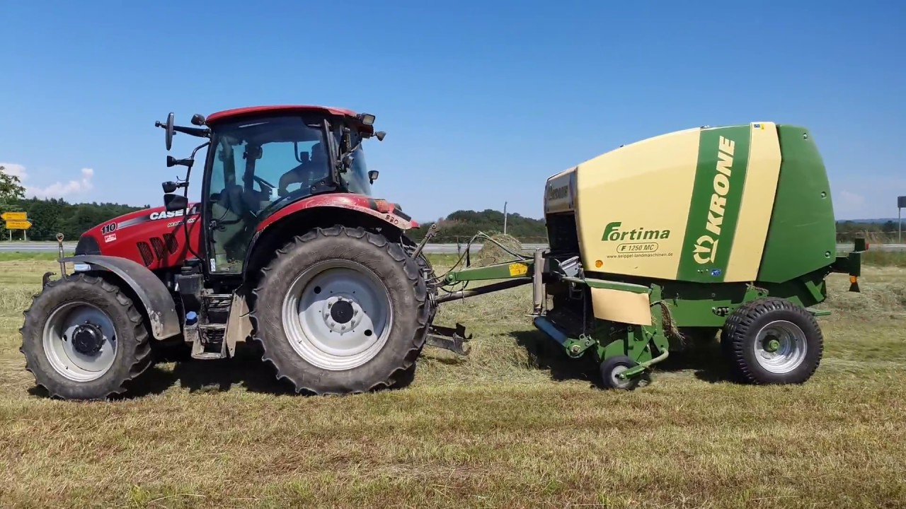 Heuernte 2019 Rundballenpressen mit Case Maxxum 110 und Krone Fortima F 1250 MC