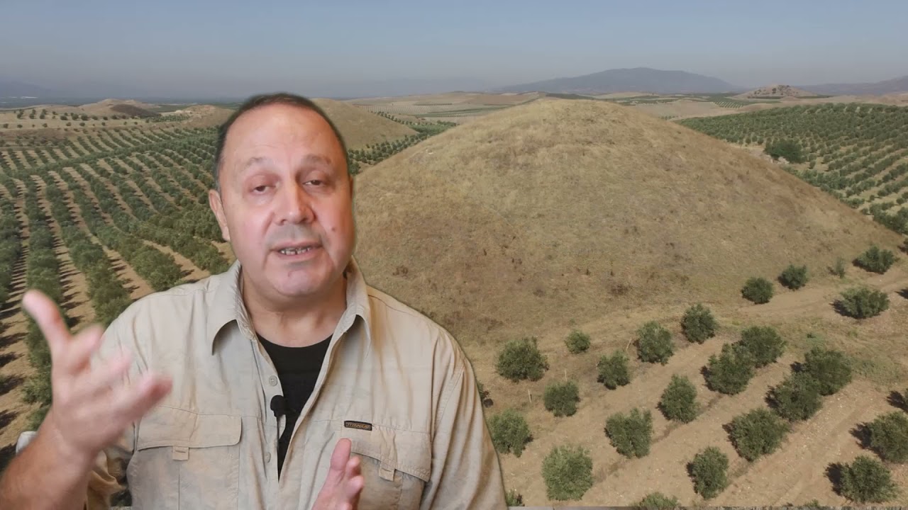 What is a tumulus grave?