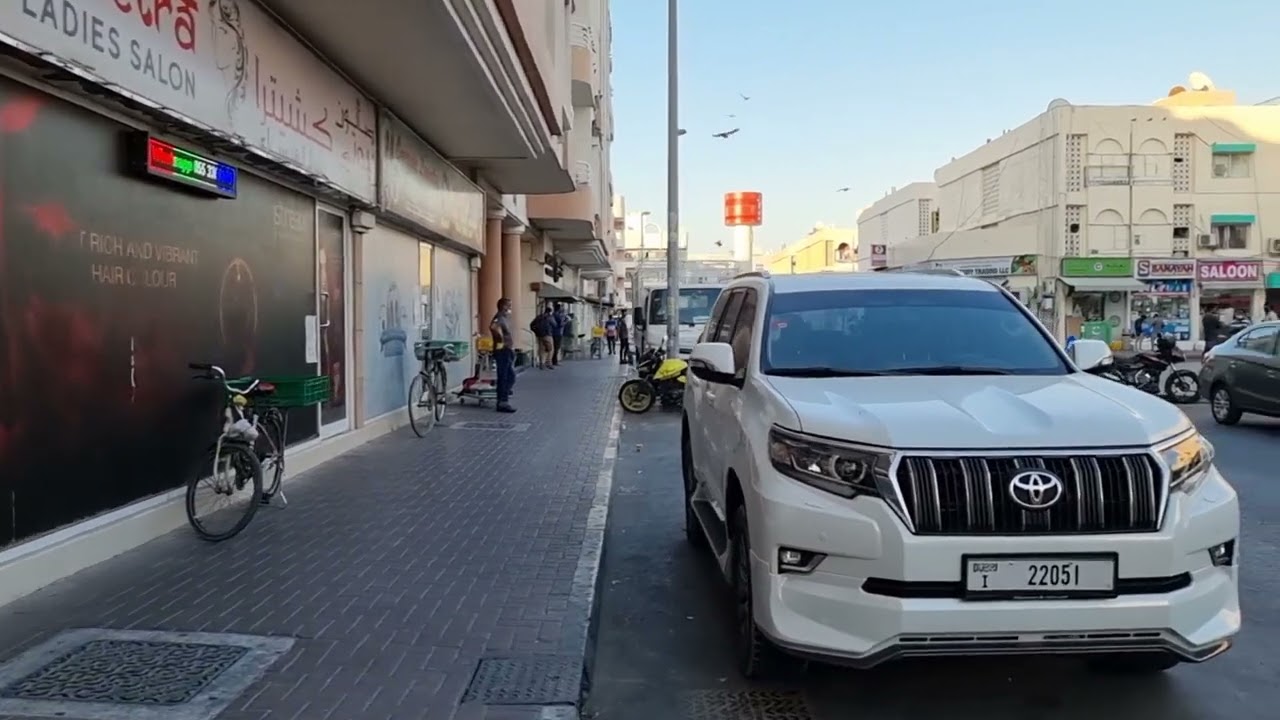 Dubai Karama dilapidated bldg block to Burjuman walk tour via ADCB Metro Station